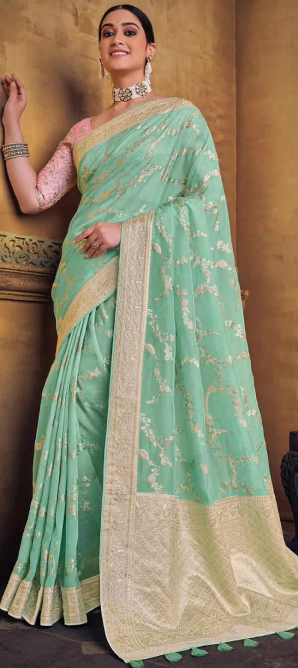 Emerald Enchantment Pista Green Dola Silk Embroidered Saree